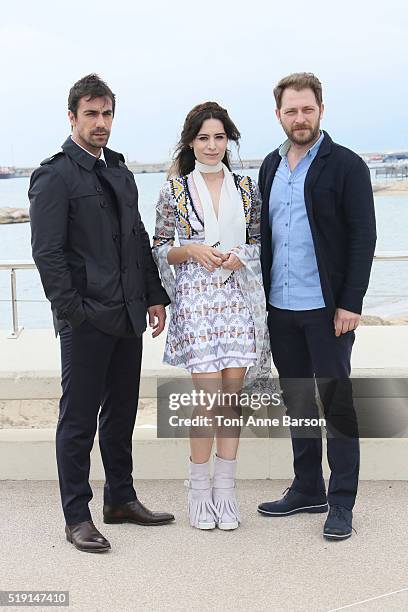 Ibrahim Celikkol, Belcim Bilgin and Alican Yucesoy attend "Intersection" Photocall as part of MIPTV 2016 on April 4, 2016 in Cannes, France.