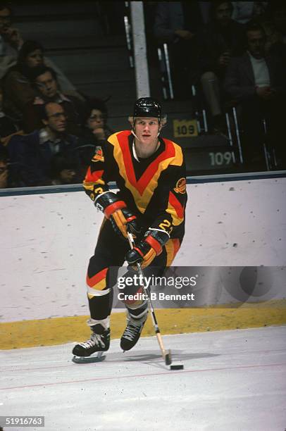 Swedish professional hockey player Thomas Gradin forward of the Vancouver Canucks skates on the ice during an away game against the New York...