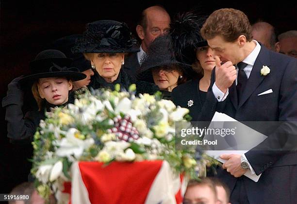 Princess Alexandra follows the coffin of her husband Sir Angus Ogilvy with their daughter Marina and son James after his funeral held in St Georges...