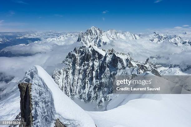 view of the mont blanc massif from the aiguille du midi - laurent sauvel stock pictures, royalty-free photos & images