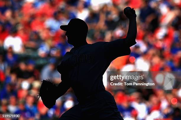 Mike Montgomery of the Seattle Mariners pitches against the Texas Rangers in the bottom of the eighth inning on Opening Day at Globe Life Park in...