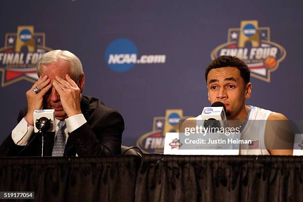 Head coach Roy Williams of the North Carolina Tar Heels and Marcus Paige react after being defeated by the Villanova Wildcats 77-74 in the 2016 NCAA...