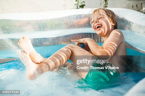 Boy In The Water In Pool High Res Stock Photo Getty Images boy-in-the-water-in-pool-high-res-stock-photo-getty-images