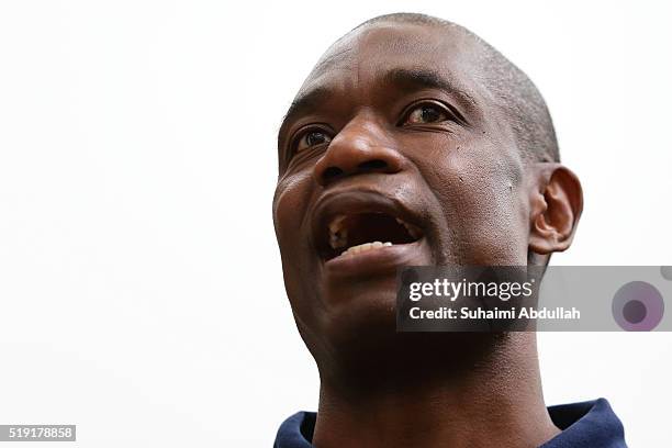 Former NBA basketball player Dikembe Mutombo speaks to the media at Marina Bay Sands on April 5, 2016 in Singapore. Mutombo is a member of the...