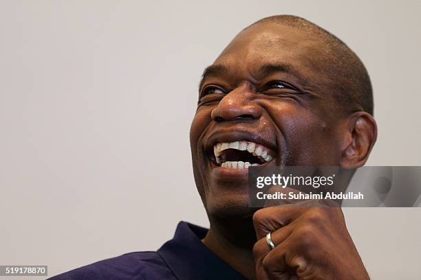 Former NBA basketball player Dikembe Mutombo speaks to the media at Marina Bay Sands on April 5, 2016 in Singapore. Mutombo is a member of the...