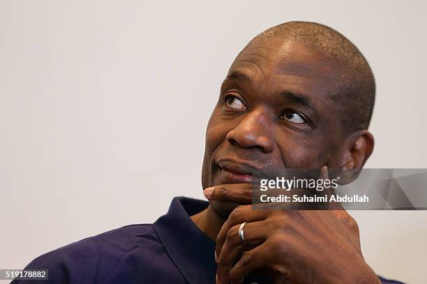 Former NBA basketball player Dikembe Mutombo speaks to the media at Marina Bay Sands on April 5, 2016 in Singapore. Mutombo is a member of the...