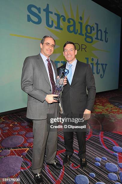 President of Wells Fargo Securities, Jon Weiss and chief marketing officer at Ritz-Carlton, Ed French pose with an award at PFLAG National's eighth...