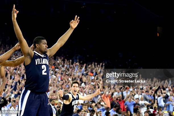 Kris Jenkins of the Villanova Wildcats celebrates after making the game-winning three pointer to defeat the North Carolina Tar Heels 77-74 in the...