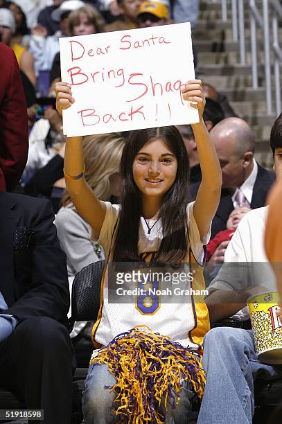Fan of Kobe Bryant of the Los Angeles Lakers hopes Santa Claus will bring Shaquille O'Neal of the Miami Heat back to the Lakers, on December 25, 2004...
