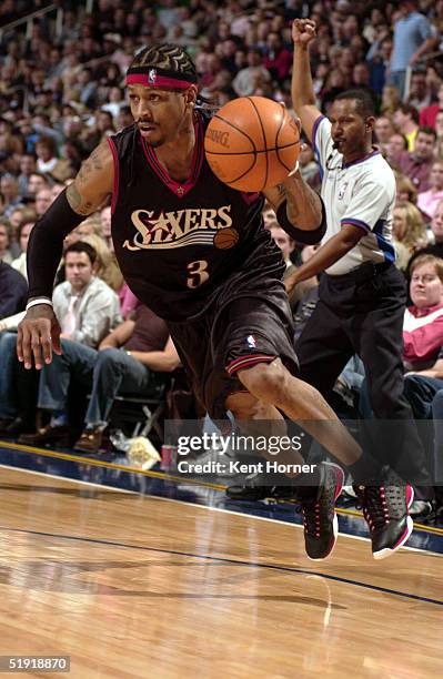 Allen Iverson of the Philadelphia 76ers drives against the Utah Jazz on January 5, 2005 at the Delta Center in Salt Lake City, Utah. The Sixers beat...