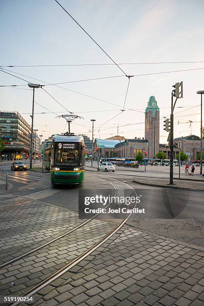 tram and train station in helsinki, finland - trambaan stockfoto's en -beelden