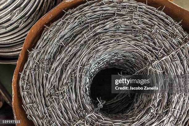 Barb Wire Rool 307 Barbed Wire Roll Stock Photos, High-Res Pictures, and Images ...