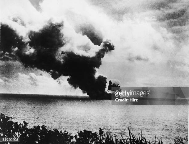 View of a mostly underwater volcanic eruption on the island of Anak Krakatau , Indonesia, late 1920s.