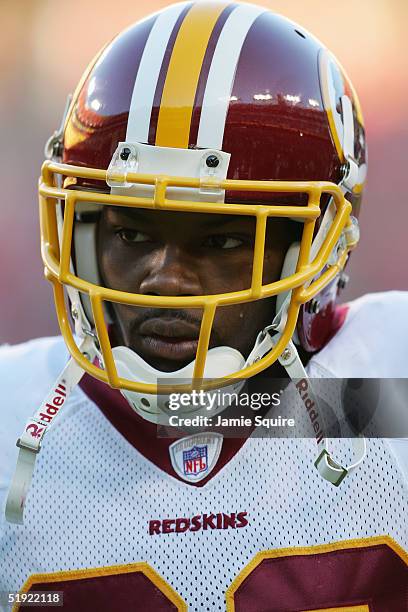 Safety Sean Taylor of the Washington Redskins looks on while facing the Cincinnati Bengals during the game at FedEx Field on December 12, 2004 in...