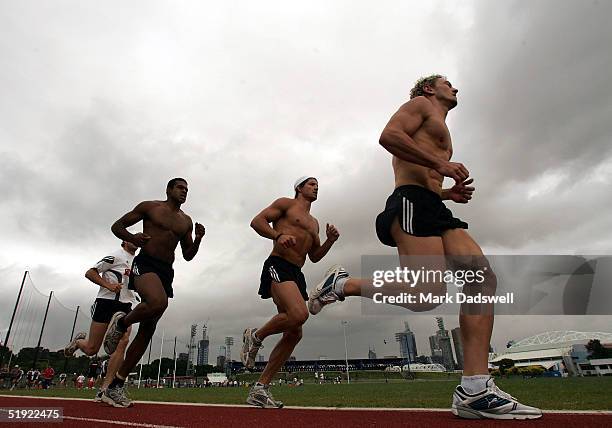 Harry O'Brien, Brodie Holland and Shane Woewodin of the Magpies in action during a 2km time trial at the Lexus Centre Training Ovalduring the...