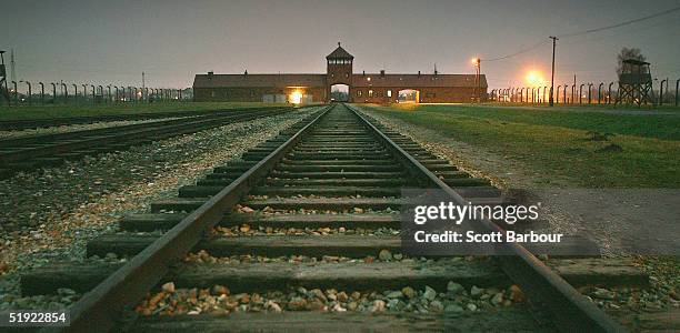 The railway tracks leading to the main gates at Auschwitz II - Birkenau seen December 10 the camp was built in March 1942 in the village of...