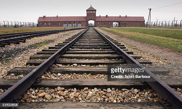 The railway tracks leading to the main gates at Auschwitz II - Birkenau seen December 10, 2004 the camp was built in March 1942 in the village of...