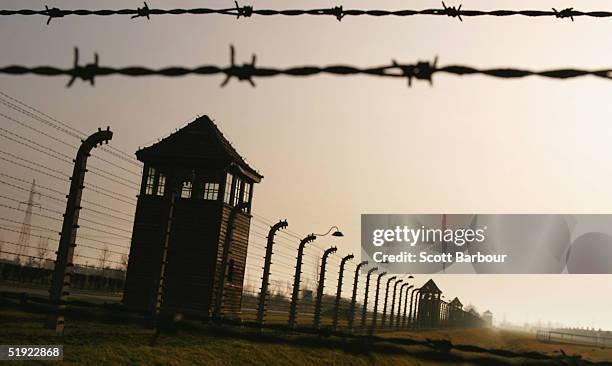 Watch towers surrounded by mulitiple high voltage fences, December 10, 2004 at Auschwitz II - Birkenau which was built in March 1942 in the village...