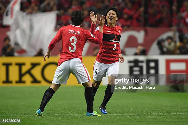 Yuki Muto of Urawa Red Diamonds celebrates the first goal during the AFC Champions League Group H match between Urawa Red Diamonds and Guangzhou...