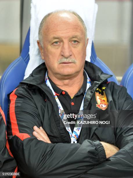 China's Guangzhou Evergrande head coach Luiz Felipe Scolari attends a football match against Japan's Urawa Reds at the AFC champions league first...