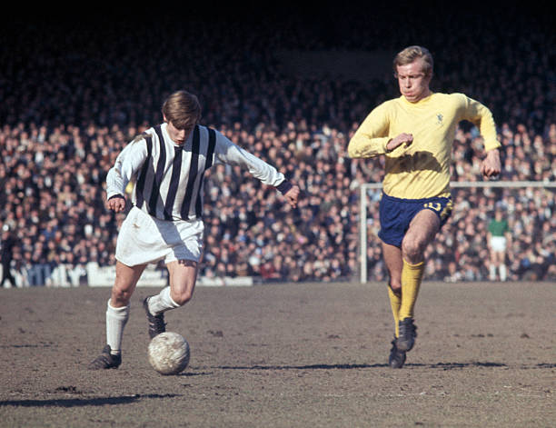Asa Hartford of West Bromwich Albion is chased by Alan Birchenall of Chelsea during their First Division match at the Hawthorns in West Bromwich, 8th...