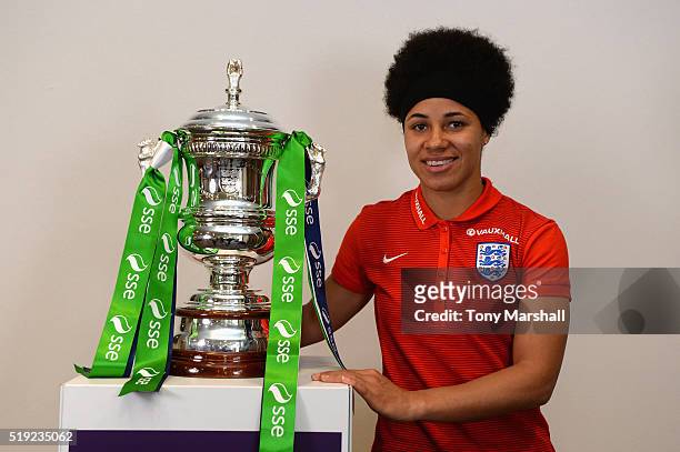 Demi Stokes of Manchester City poses with the SSE Women's FA Cup during the England Women Training Session at St Georges Park on April 5, 2016 in...