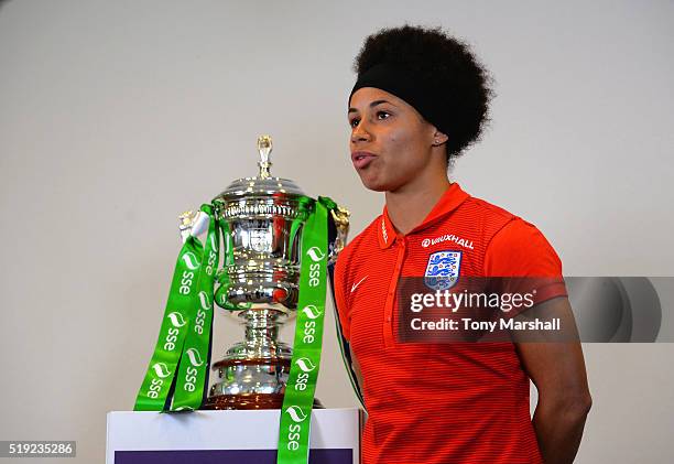 Demi Stokes of Manchester City poses with the SSE Women's FA Cup during the England Women Training Session at St Georges Park on April 5, 2016 in...