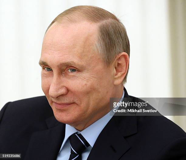 Russian President Vladimir Putin attends a meeting with French Senate President Gerard Larcher in the Kremlin on April 5, 2016 in Moscow, Russia....