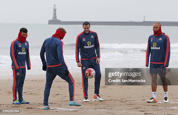 DeAndre Yedlin, Seb Larsson, John O'Shea and Wes Brown during a Sunderland training Session at Roker Beach on April 05, 2016 in Sunderland, England.