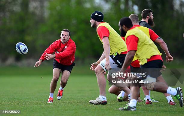 Neil de Kock of Saracens releases a pass during a training session ahead of the Champions Cup Quarter Final against Northampton Saints at Saracens...