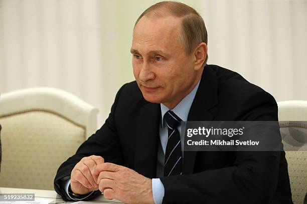 Russian President Vladimir Putin attends a meeting with French Senate President Gerard Larcher in the Kremlin on April 5, 2016 in Moscow, Russia....