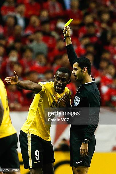 Jackson Martinez of Guangzhou Evergrande receives a yellow card from the referee during the AFC Champions League Group H match between Urawa Red...