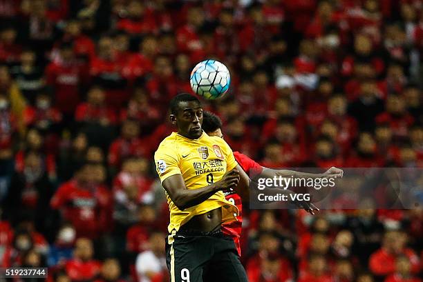 Jackson Martinez of Guangzhou Evergrande jumps to head the ball during the AFC Champions League Group H match between Urawa Red Diamonds and...