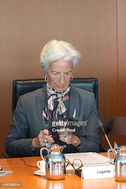 President Christine Lagarde looks on during talks with international finance organisations in the German chancellery on April 5, 2016 in Berlin,...