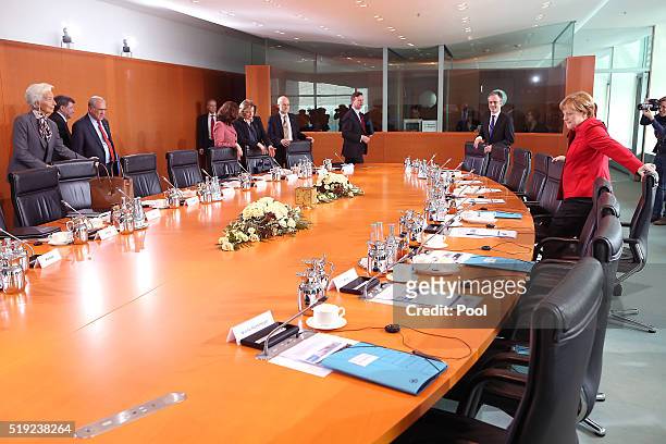 German Chancellor Angela Merkel and IMF president Christine Lagarde prepare prior talks with international finance organisations in the German...