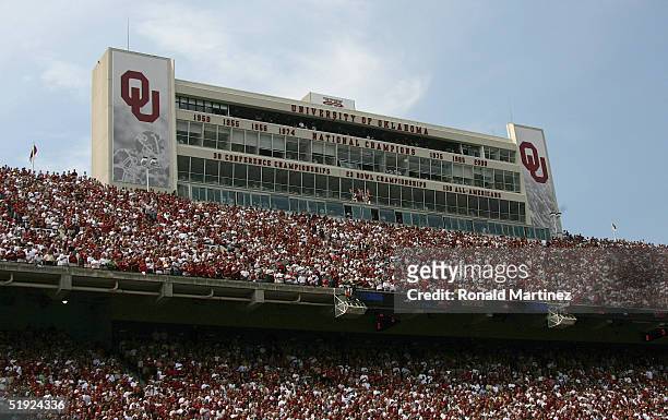 Fans of the Oklahoma Sooners football team watch them face the University of Oregon Ducks on September 18, 2004 at Memorial Stadium in Norman,...