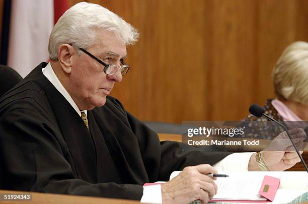 Circuit Judge Marcus Gordon sits on the bench for the arraignment of Edgar Ray Killen for three counts of murder in the 1964 slayings of three civil...