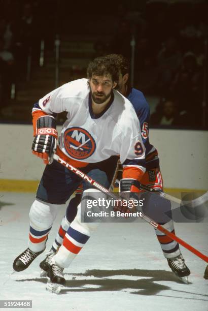 Canadian hockey player Clark Gillies, forward for the New York Islanders, plays in a home game against the New York Rangers at Nassau Coliseum,...