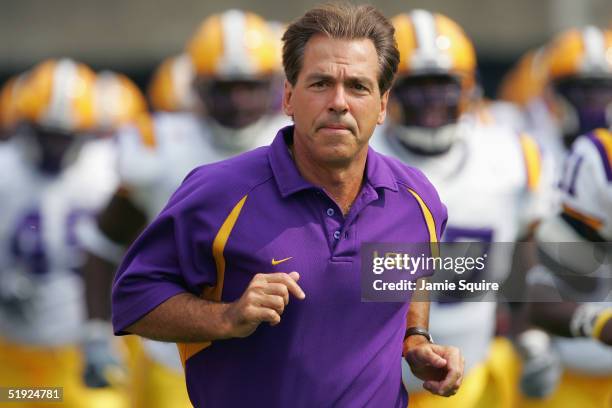 Head coach Nick Saban of the Louisiana State University Tigers takes the field against the Georgia Bulldogs during the game at Sanford Stadium on...