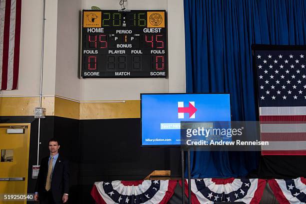Secret service agent keeps watch before Democratic presidential candidate Hillary Clinton hosts a Women for Hillary Town Hall meeting with New York...