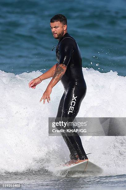 Guy Sebastian enjoys a surf at Bronte beach on April 1, 2016 in Sydney, Australia.