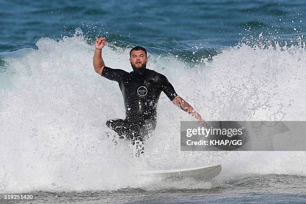 Guy Sebastian enjoys a surf at Bronte beach on April 1, 2016 in Sydney, Australia.