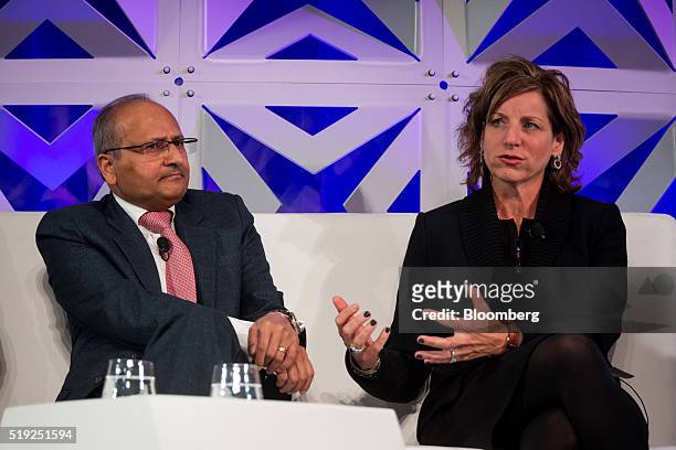 Maryrose Sylvester, president and chief executive officer of GE Current, speaks as Anil Srivastava, chief executive officer of Leclanche SA, listens...