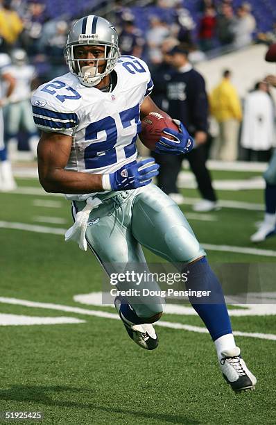 Running back Eddie George of the Dallas Cowboys runs upfield before facing the Baltimore Ravens during the game at M&T Bank Stadium on November 21,...