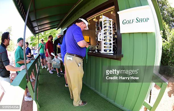 Fans shop for merchandise at the Golf Shop during a practice round prior to the start of the 2016 Masters Tournament at Augusta National Golf Club on...