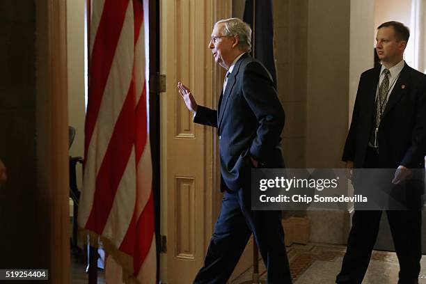 Senate Majority Leader Mitch McConnell walks back to his office following the Senate Republican's weekly policy luncheon at the U.S. Capitol April 5,...