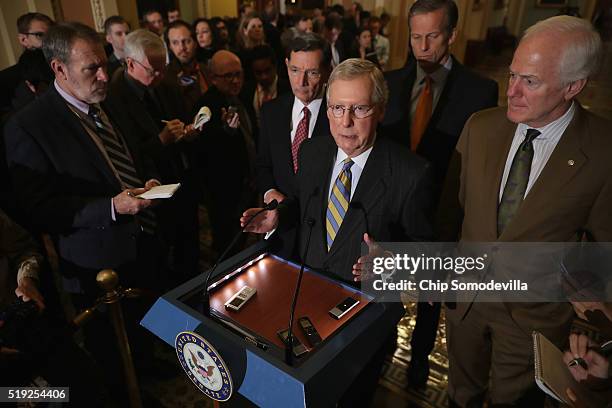 Senate Majority Leader Mitch McConnell and fellow Republican senators Sen. John Barrasso , Sen. John Thune and Senate Majority Whip John Cornyn talk...