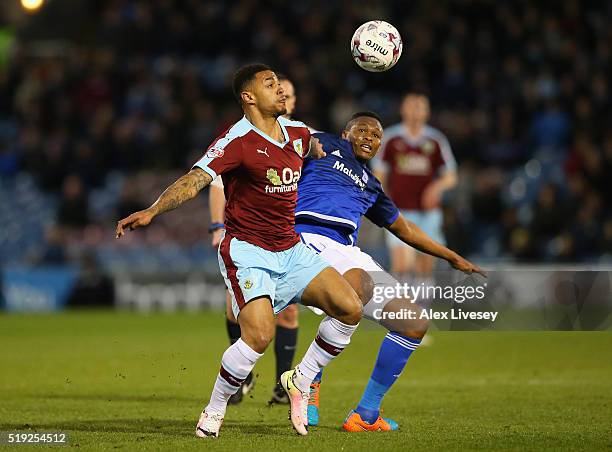 Andre Gray of Burnley controls the ball ahead of Kagisho Dikgacoi of Cardiff City during the Sky Bet Championship match between Burnley and Cardiff...