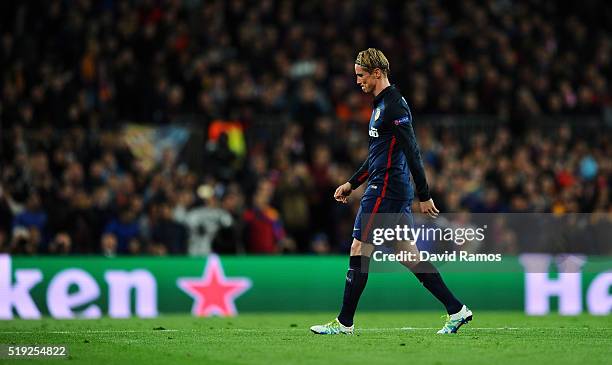 Fernando Torres of Atletico Madrid looks dejected as he is shown a red card and is sent off during the UEFA Champions League quarter final first leg...