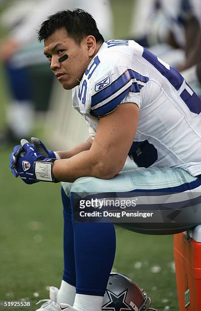 Linebacker Dat Nguyen of the Dallas Cowboys looks on while facing the Baltimore Ravens during the game at M&T Bank Stadium on November 21, 2004 in...